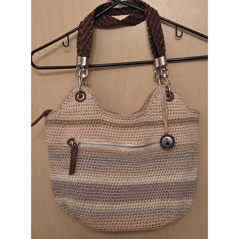 The Sak Striped Crochet Leather Strap Hobo Purse Shoulder Bag. Charm Logo